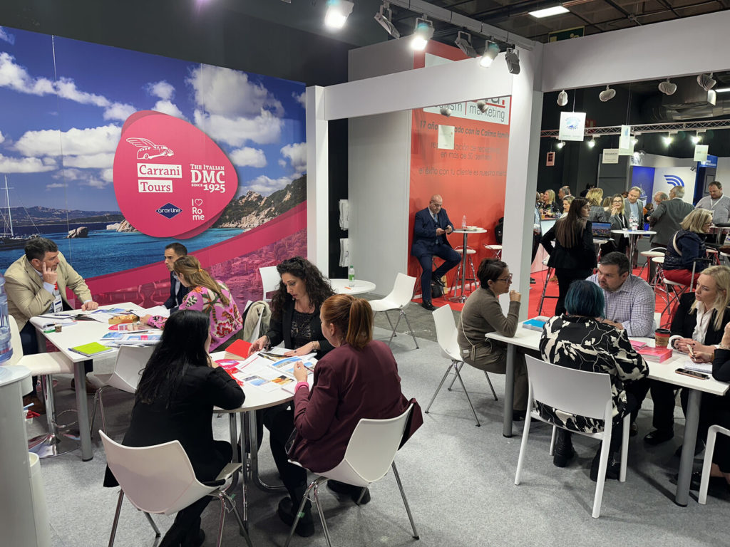 Carrani Tours team working with partners at their booth during the FITUR fair.